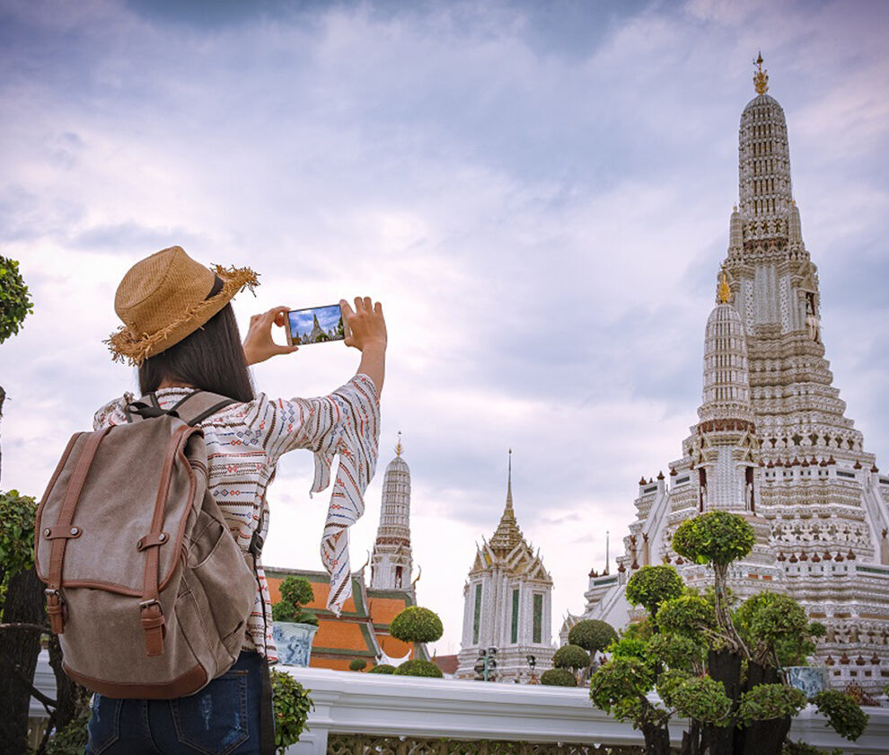 Asian woman tourists are taking photos With a smartphone at the