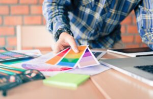 designer choosing colors for doing graphic on lapt 2022 12 16 03 40 06 utc 300x193 1